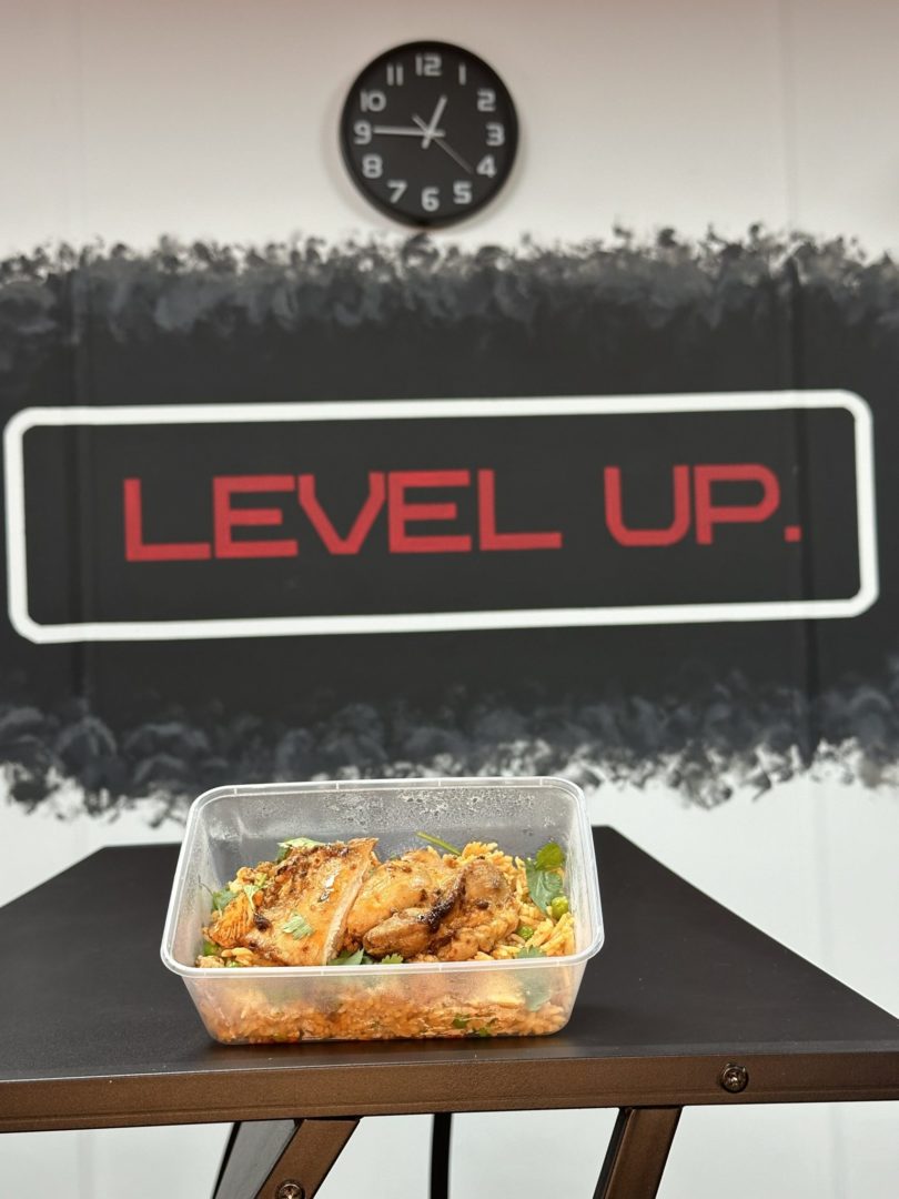 Chipotle Chicken, with the level up logo behind the food