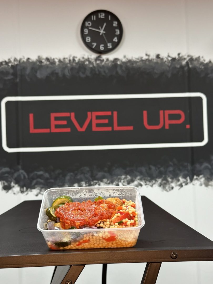 Chicken Shawarma, with the level up logo behind the food
